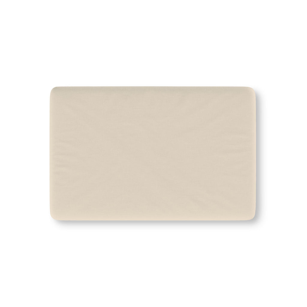 Solid Beige Crib Sheet laid flat in Mini size in a plain warm beige