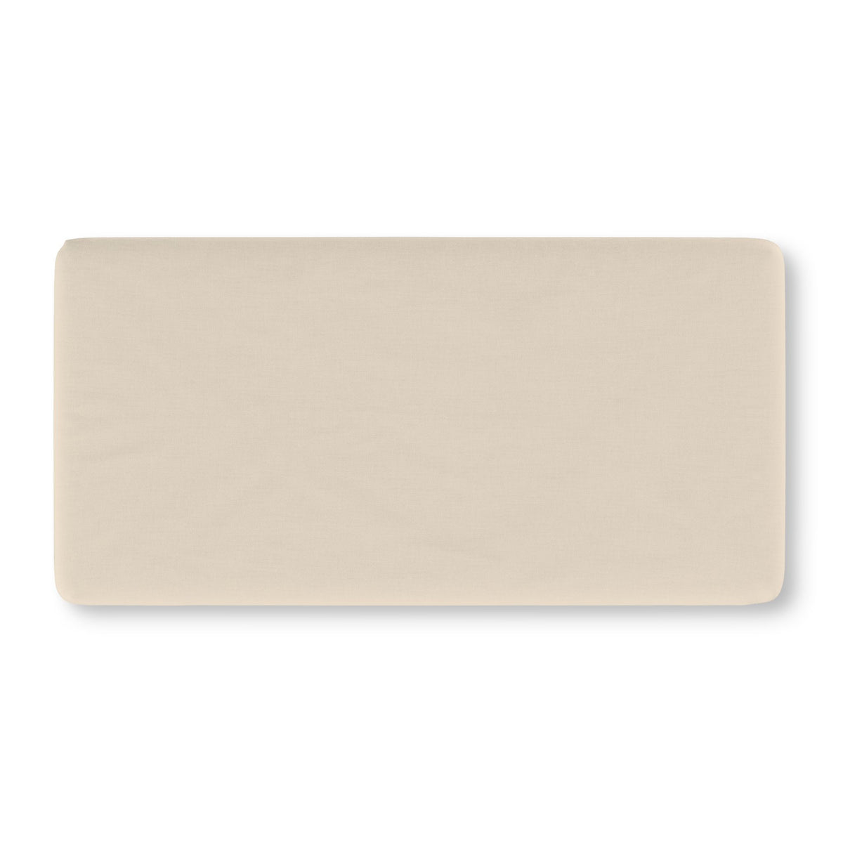 Solid Beige Crib Sheet laid flat in Standard size in a plain warm beige