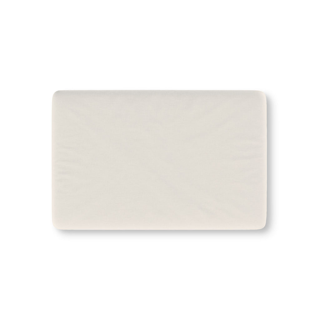 Solid Ivory Crib Sheet laid flat in Mini size in a plain ivory white