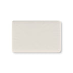 Solid Ivory Crib Sheet laid flat in Mini size in a plain ivory white