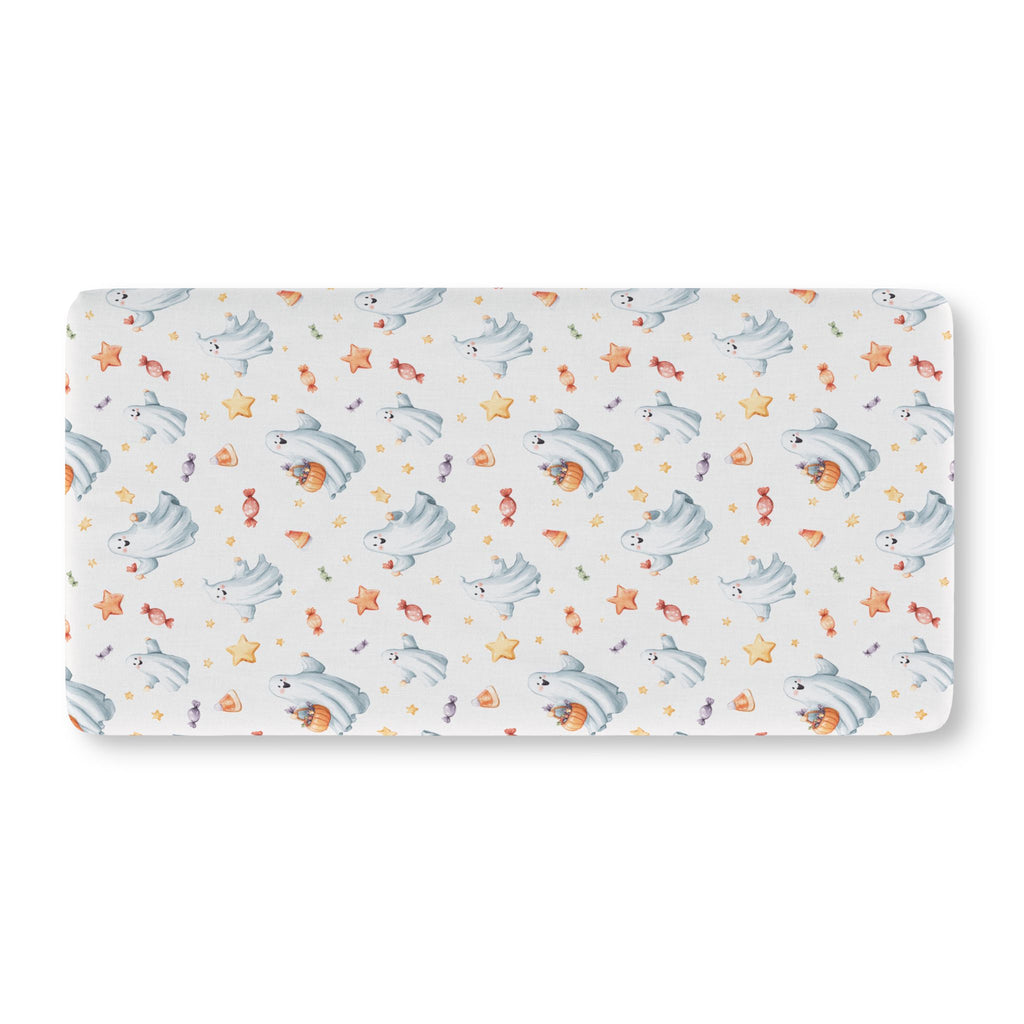 Watercolor Ghost Crib Sheet laid flat in Standard size with dusty blue ghosts, candy and stars on pale gray