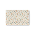 Winter Cat Crib Sheet laid flat in Mini size with cream cats and pine sprigs on ivory