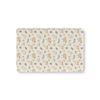 Winter Cat Crib Sheet laid flat in Mini size with cream cats and pine sprigs on ivory