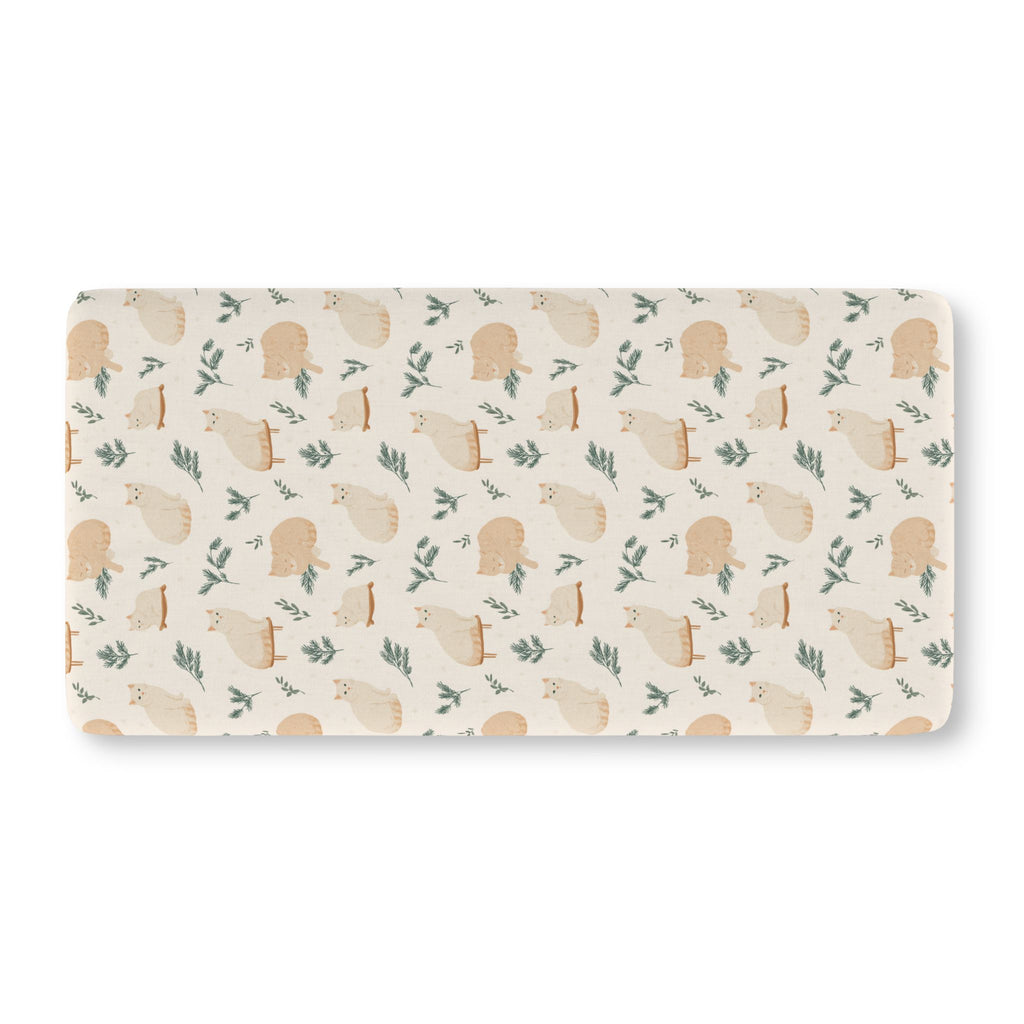 Winter Cat Crib Sheet laid flat in Standard size with cream cats and pine sprigs on ivory