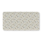 Winter Penguin Crib Sheet laid flat in Standard size with penguins and pine trees on pale sage